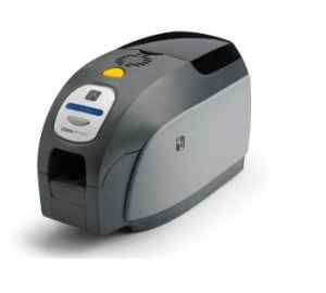 A Zebra ZXP Series 3 single sided ID card printer, predominantly gray in color, with a yellow accent on the button.